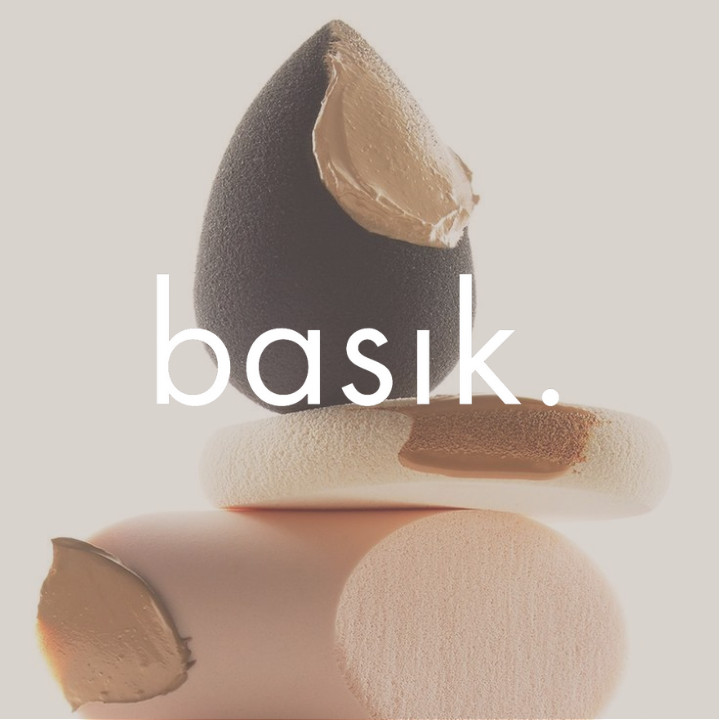 basik. beauty branding design featuring minimalist typography and cosmetic products